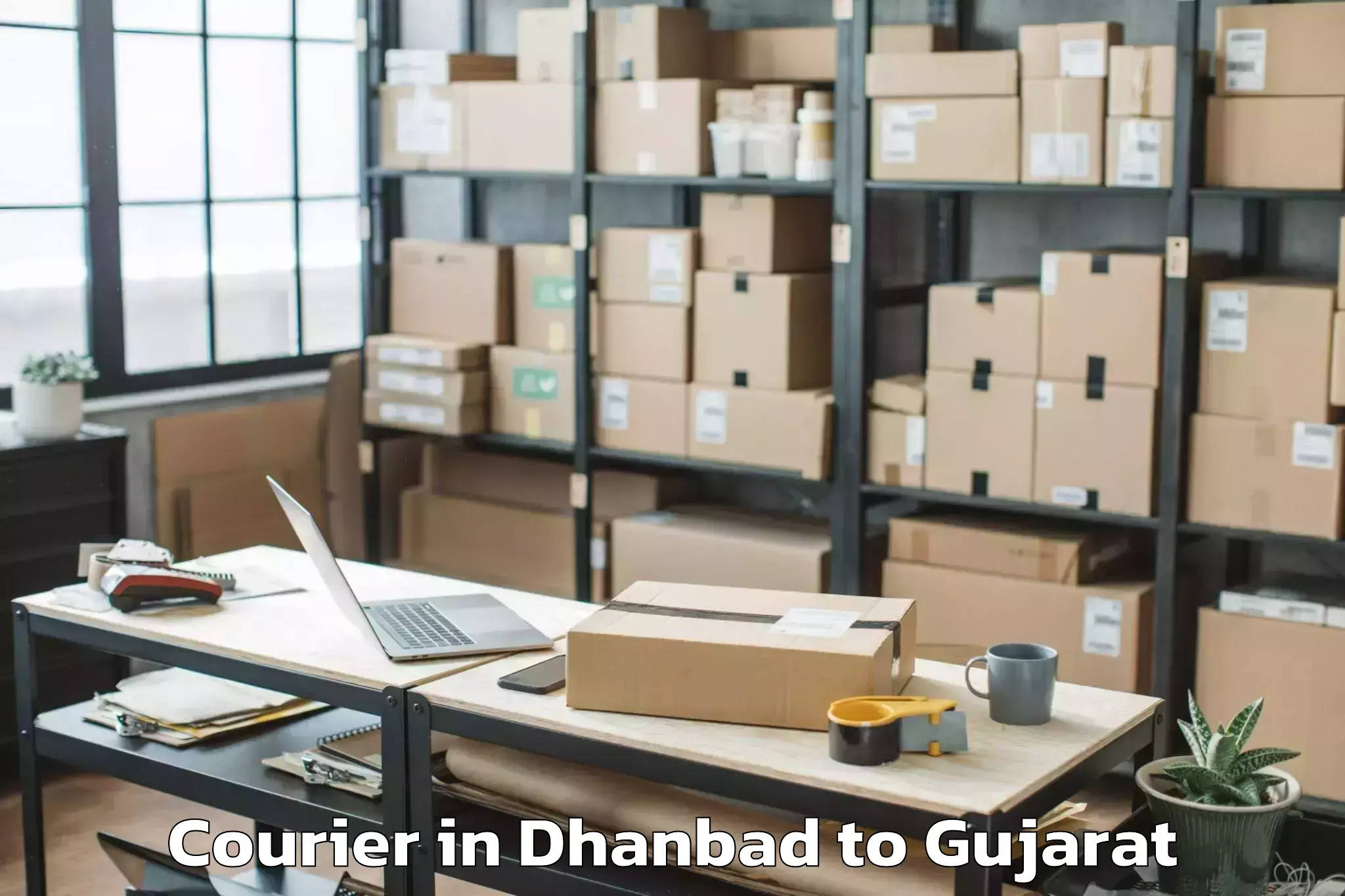 Leading Dhanbad to Keshod Airport Ixk Courier Provider